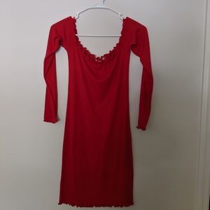 Red off the shoulder, long sleeve, ribbed dress.